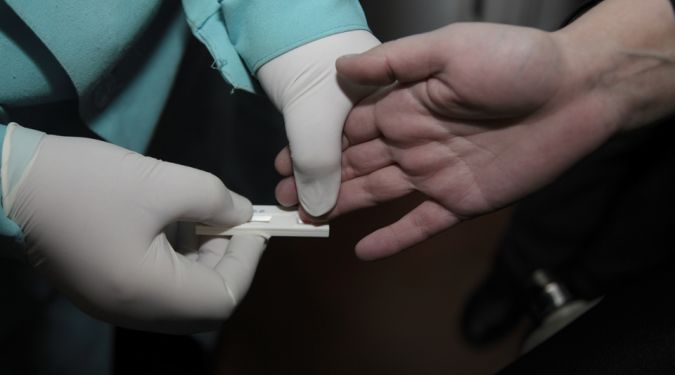 Testing sex worker for HIV and STDS. Mobile STD/HIV testing van in Tamozhennaya Square. Ukraine. 2010.