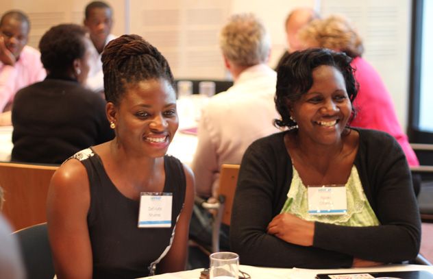 Two meeting participants—Definate Nhamo, Pangaea Zimbabwe AIDS trust (L); and Teresia Njoki Otieno African Gender and Media Initiative, Kenya.