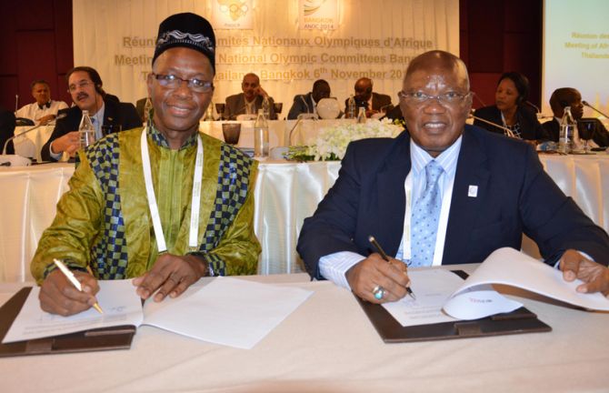 L to R: Djibril Diallo, Senior Adviser to UNAIDS Executive Director and Intendant General Lassana Palenfo, President of ANOCA during the ANOC General Assembly in Bangkok.