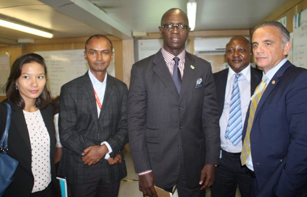 UNAIDS Staff with Major Paulo Conteh, Chief Executive Officer of Sierra Leone National Ebola Response Center 