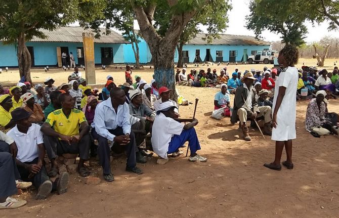 Health facility staff mobilizing community members to access health services in the Health Kiosk program in Gwanda district, Zimbabwe.  Photo Credit: World Vision Health Kiosk staff