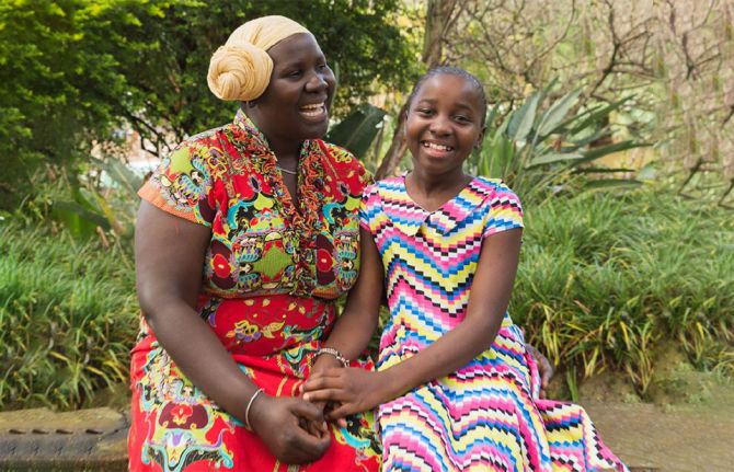 Millicent Kagonga, survivor and advocate for cervical cancer elimination, with her daughter Grace. WHO/Ash Appleton