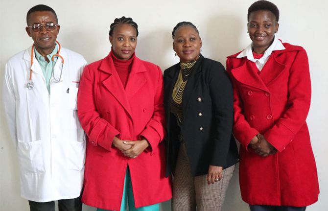 Dr. Michel Morisho (in white coat), HIV management specialist at Mbabane Government Hospital is leading the HIV treatment at the hospital. ©UNAIDS 2023