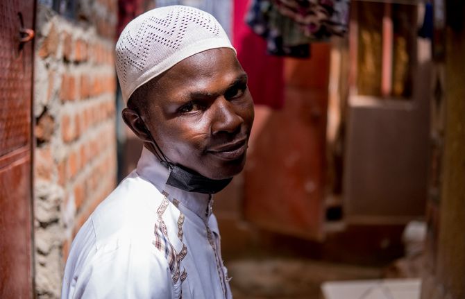 A portrait of Sekiziyivu Musa outside his home in Kasokoso suburb in Kampala, Uganda. Sekiziyivu , who is currently on Medically Assisted Therapy (MAT) is part of a group of People Who use and Inject Drugs (PWIDs) benefitting from UNAIDS Solidarity Fund t