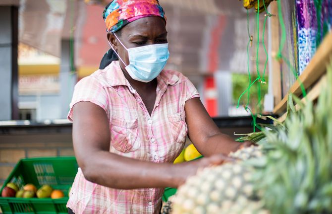 8 July, 2020 - Kigamboni, Dar es Salaam, Tanzania - Doroth Hassan, a female sex worker and a person who uses drugs buying groceries.