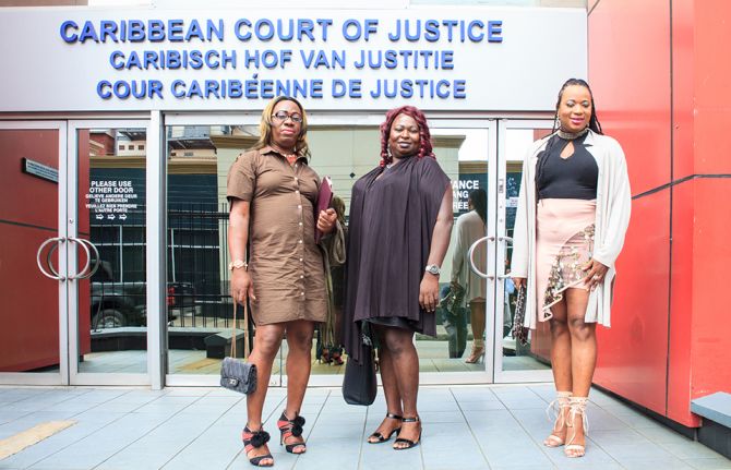 2018, Port of Spain, Trinidad. Guyana cross-dressing litigants outside Caribbean Court of Justice. Credit: Mickel Guaranfranco Alexander