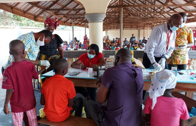 Caritas Nigeria staff conducting HIV Testing Services at St. Anthony's Parish, Enugu-Ezike