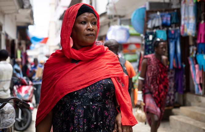 7 October, 2019 - Zanzibar, Tanzania - Teresia Francis (Teddy Francis John), peer educator, a former female sex worker walking in the streets of Zanzibar. Copyright: UNAIDS Photographer: D. Msirikale 